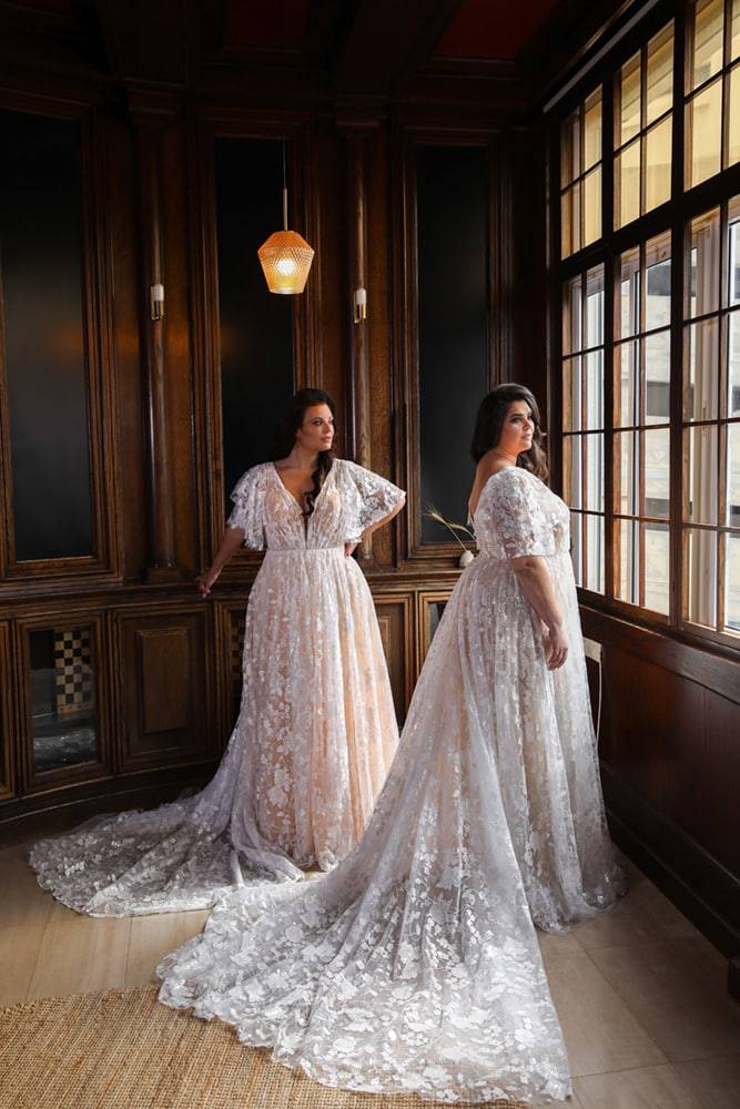 models wearing white wedding gowns by studio levana 